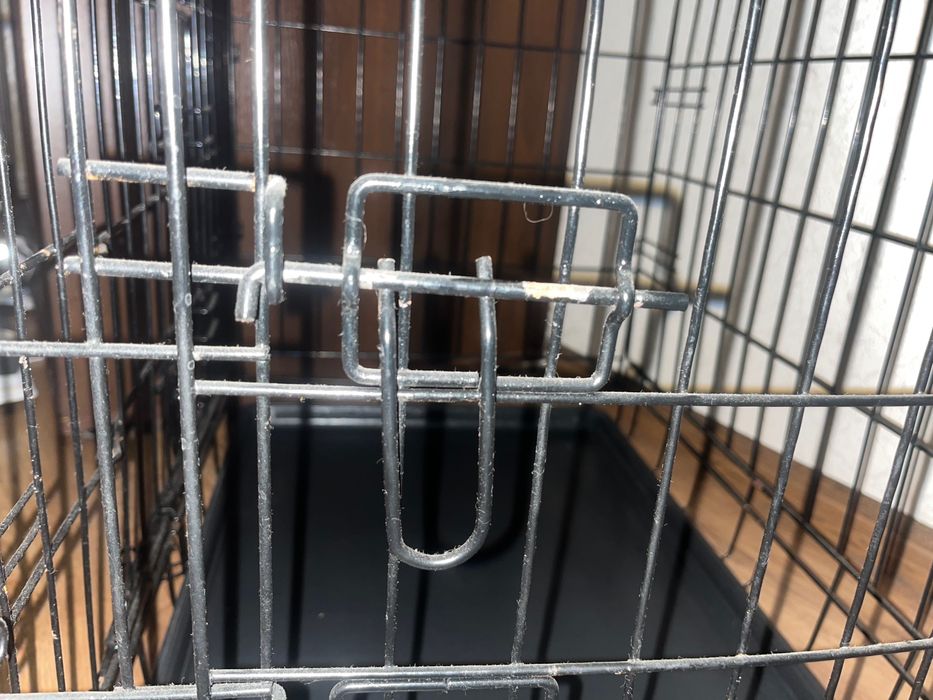 Металическая клетка для собак