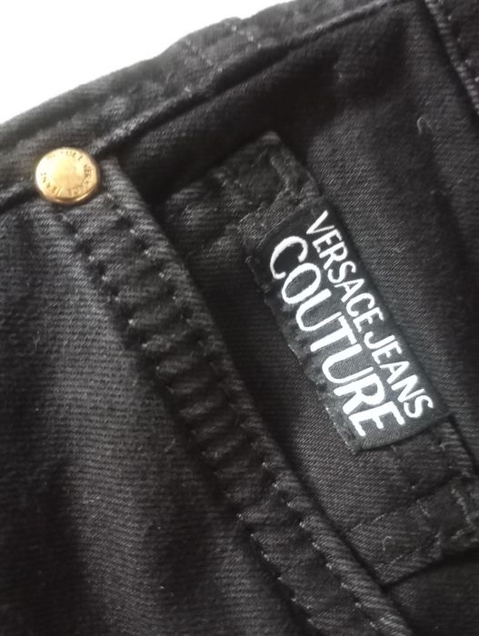 Spodnie czarne jeansowe Versace