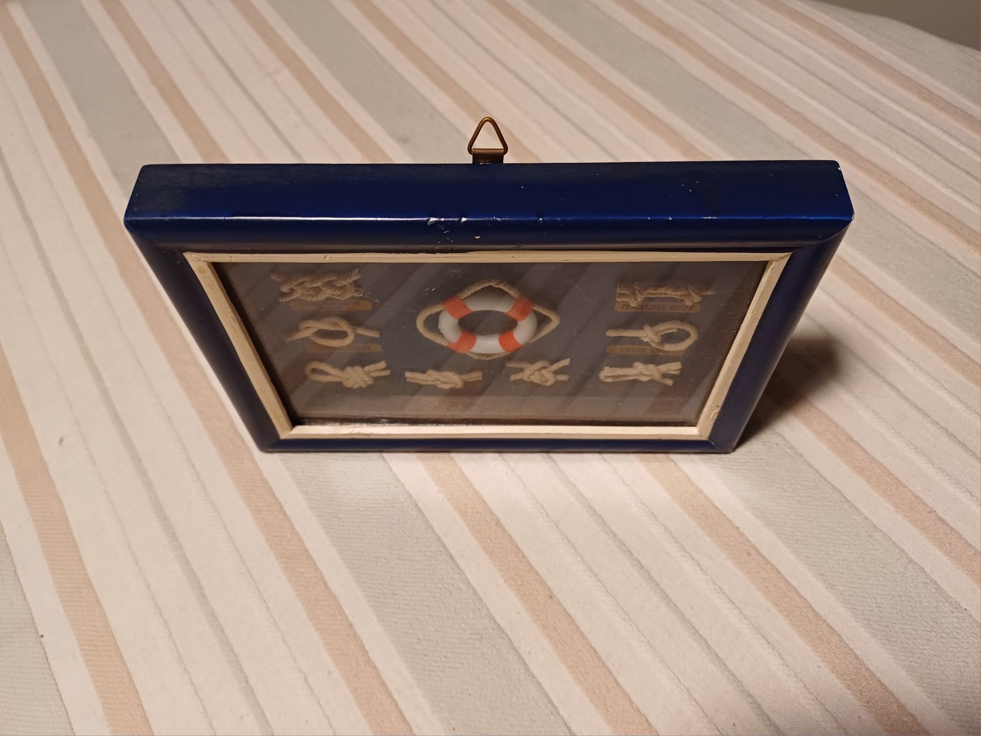 Quadro de nós de marinheiro com moldura azul