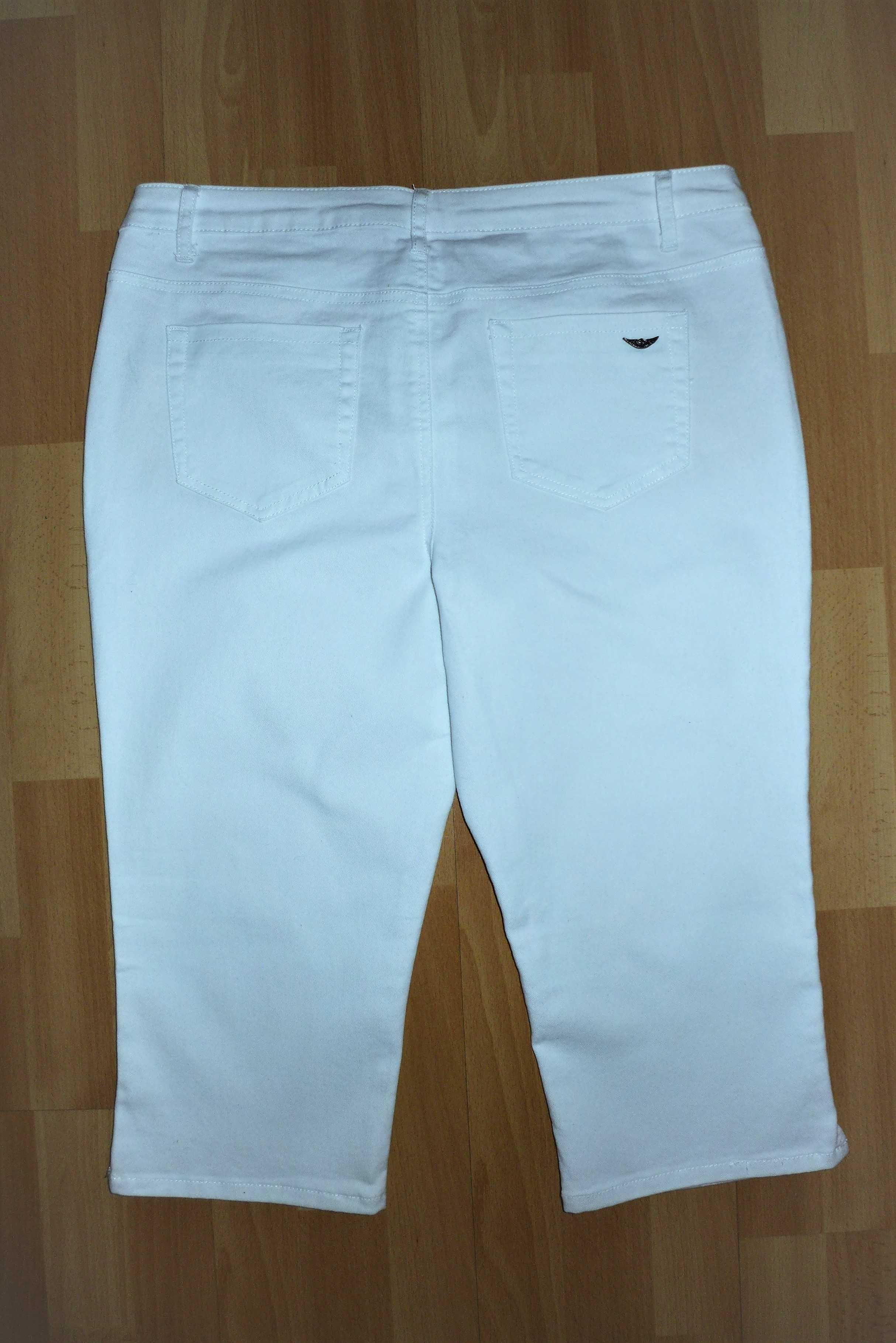 Białe spodnie gumowane 46