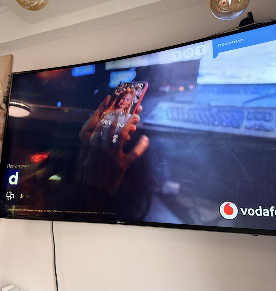 SAMSUNG  UHD-телевізор вигнутий