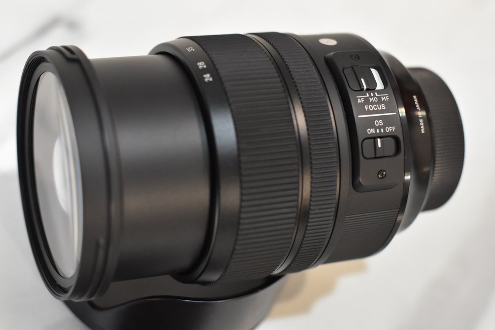 Sigma for Nikon 24-70 2.8 + Фільтр UV стан нового одна помарка
