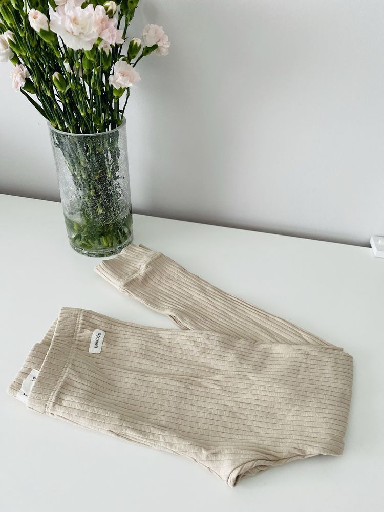 Nowe beżowe legginsy w prążki Newbie getry beż