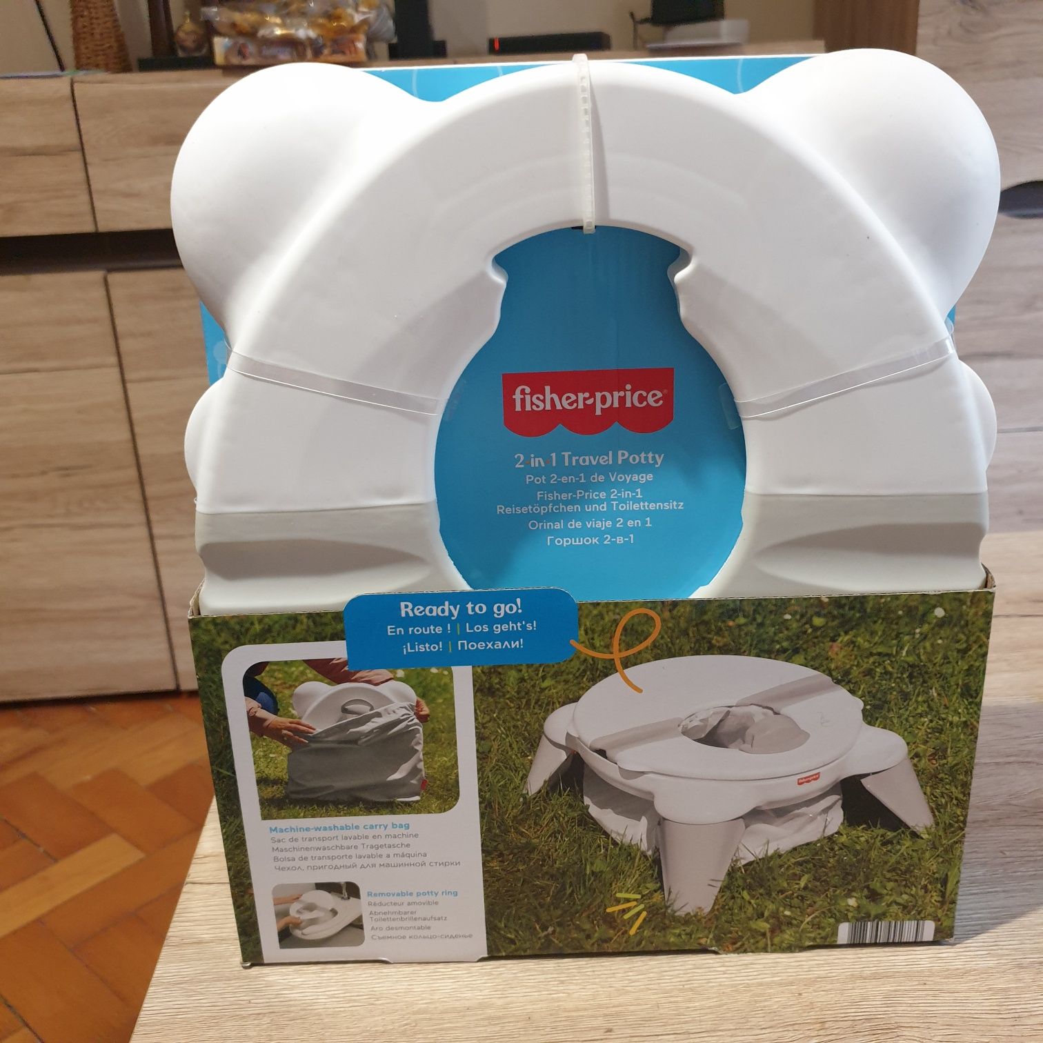 Sprzedam nowy nocnik  podróżniczy Fisher Price 2w1