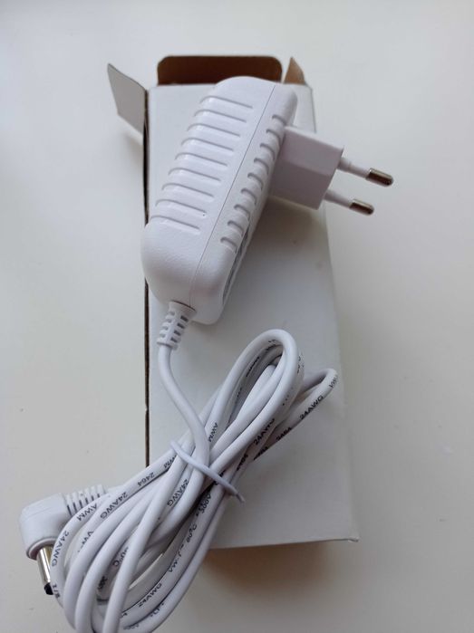 Продам адаптер, 12v  1 А.