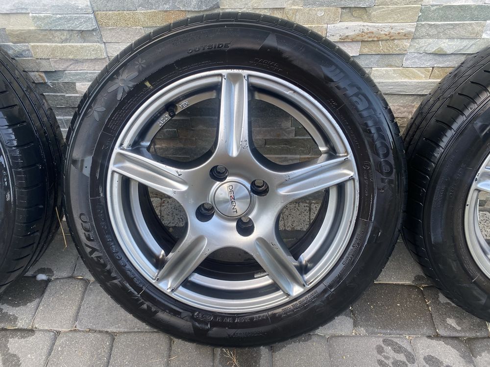 Felgi z oponami 4x100 6Jx15H2 HS Hyundai i20. DEZENT
