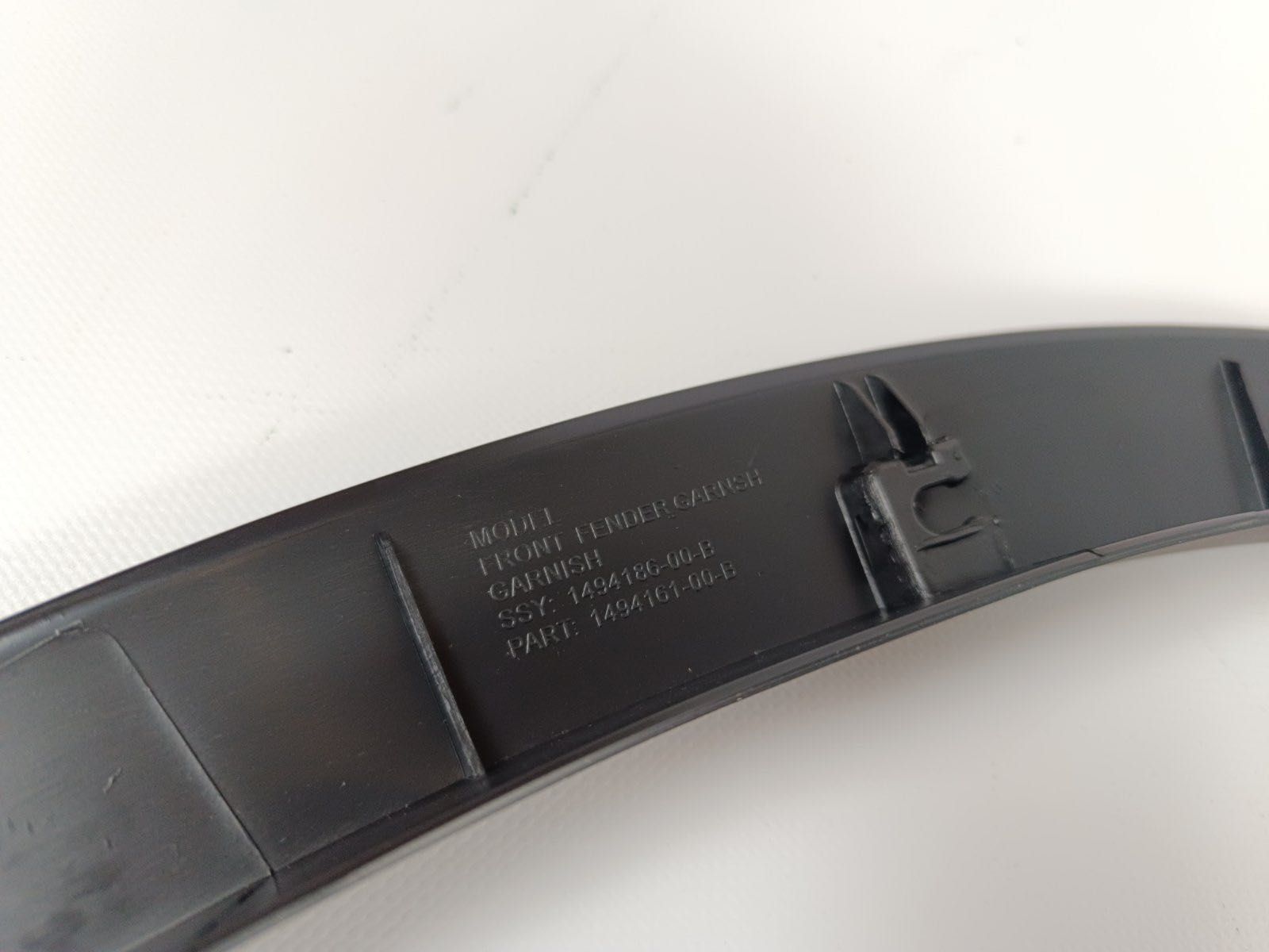 Накладка арки переднього крила ліва Tesla Model Y 1494185-00-B