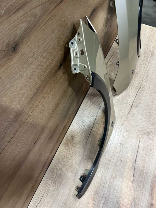 Błotnik przedni lewy prawy Skoda Fabia II Scout kolor 9205