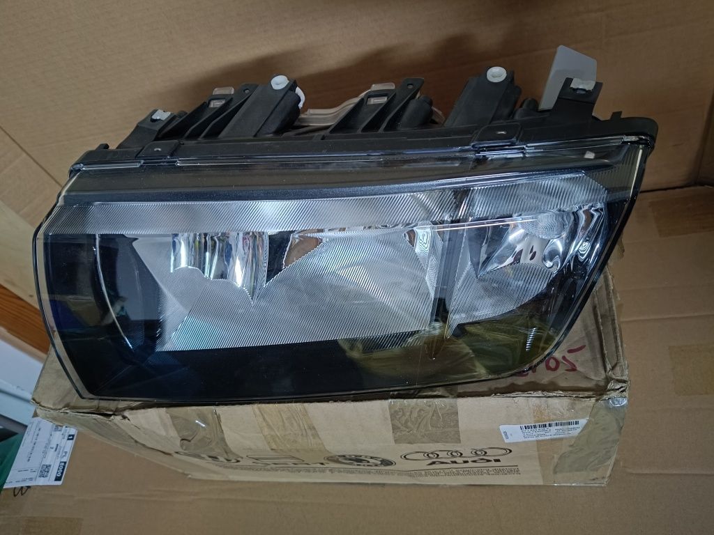 Reflektor Skoda Fabia OEM hella nowy