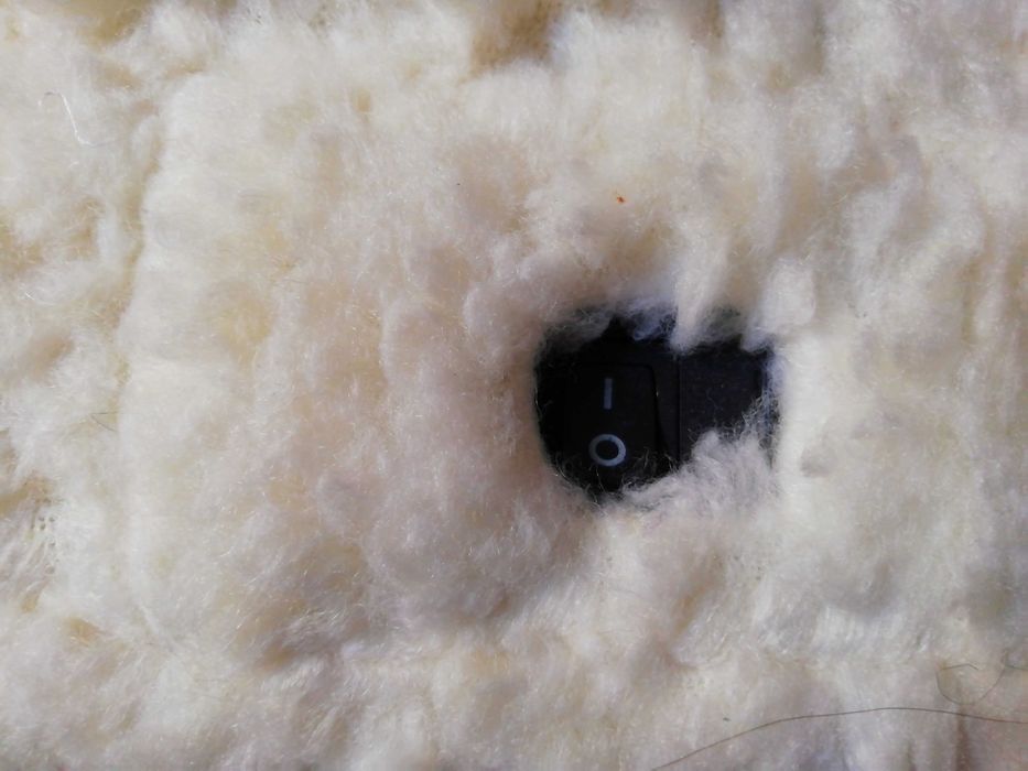 Almofada para pés com massagem