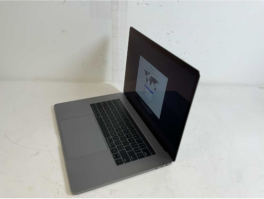 MacBook Pro 15" I7 16Gb 256 SSD Touchbar