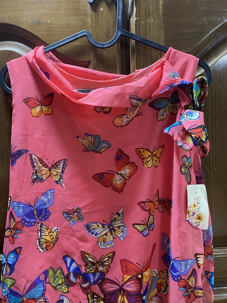Blusa rosa com borboletas
