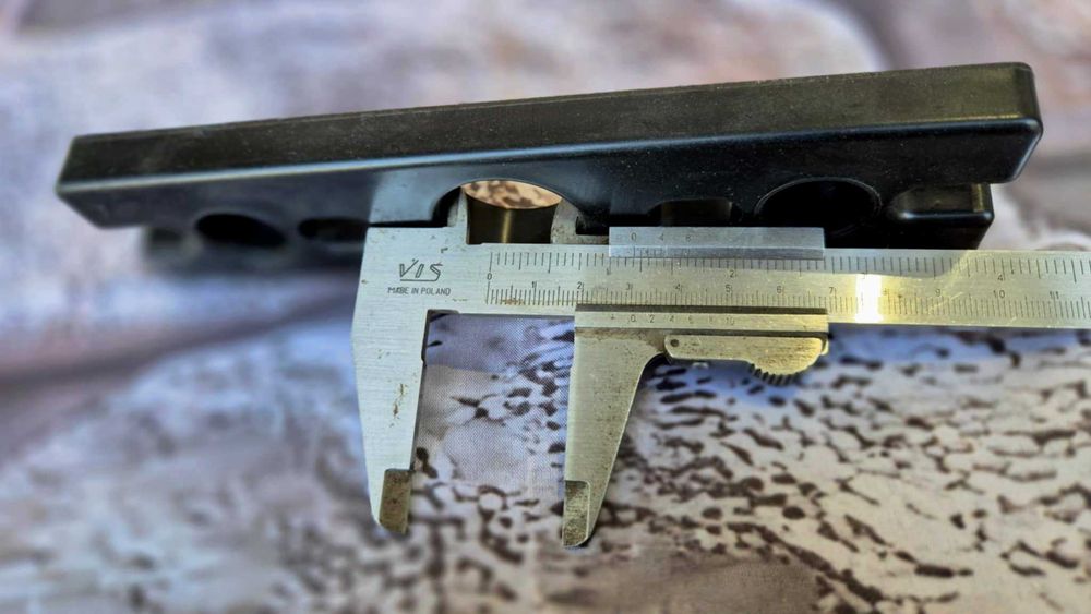 Mocowanie do prowadnic stosu na pręty fi 20mm