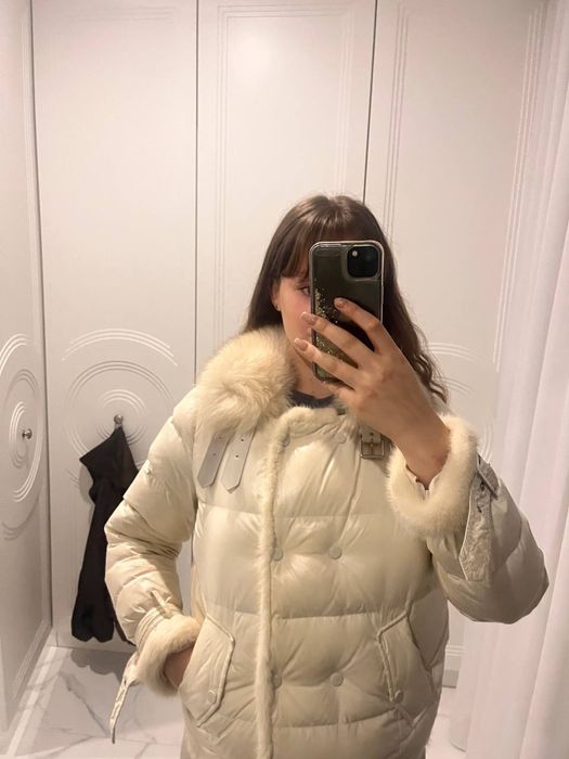 Натуральні жіночі зимові куртки