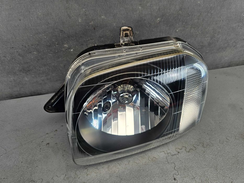 Suzuki Jimny III Lampa Przód Przednia Lewa Oryginał Europa Stan BDB