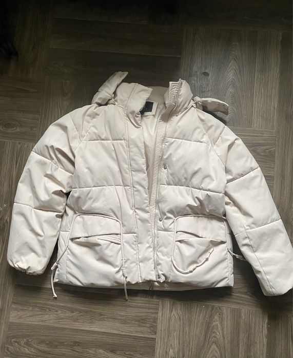 Пуховикк бежевий