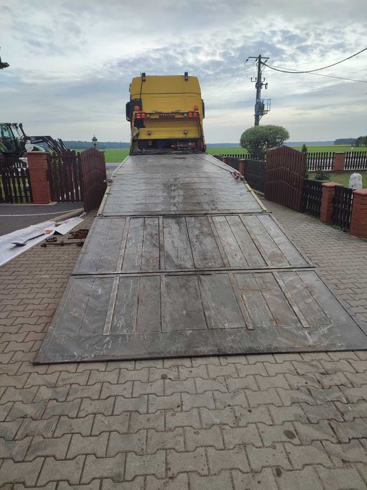 Transport maszyn rolniczych, budowlanych, traktory, pomoc drogowa