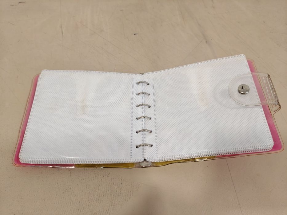 Estojo/ Porta CDs com argolas - capacidade para 24 CDs