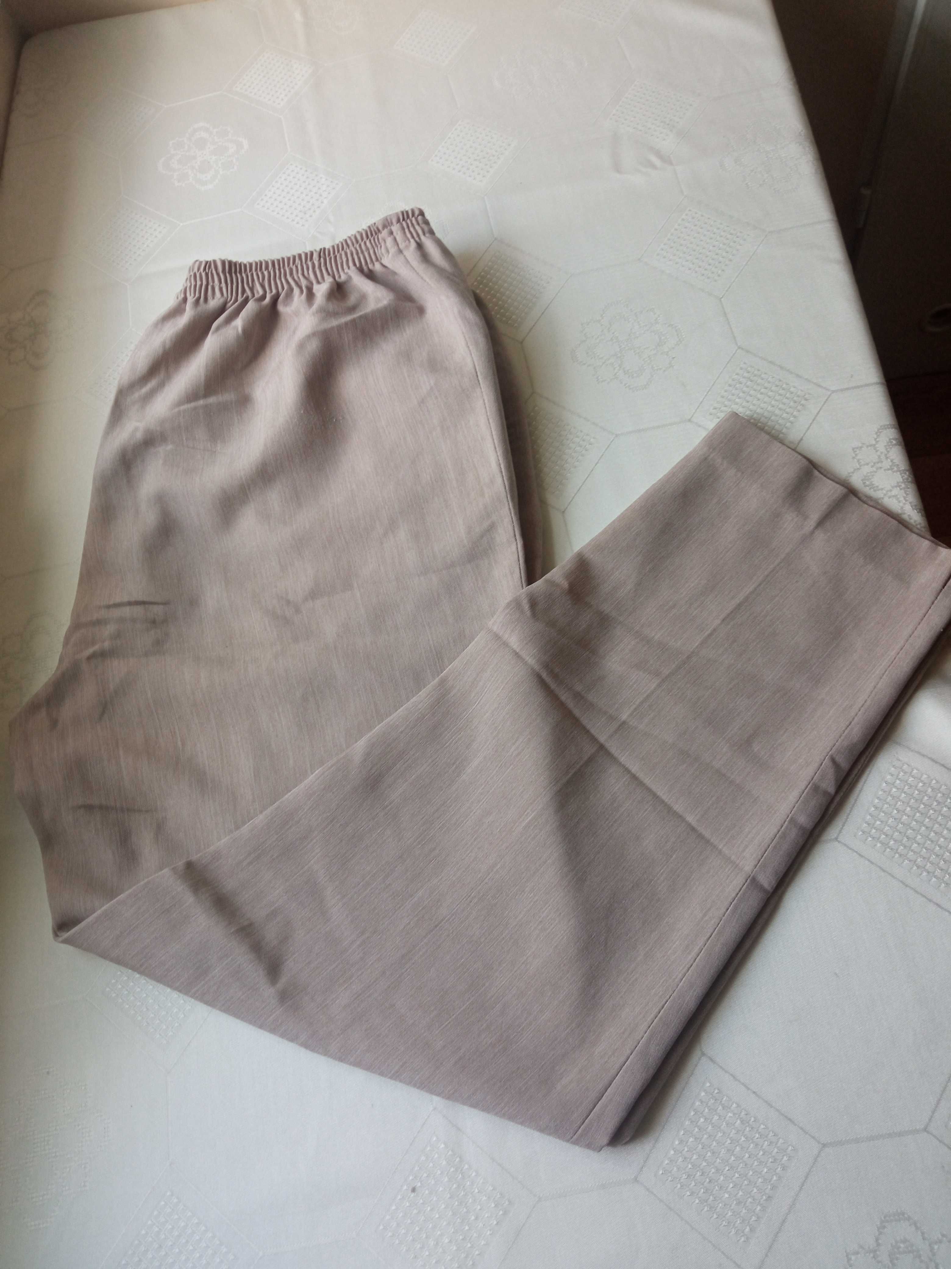 Beżowe lekkie damskie spodnie r L pas 84cm
