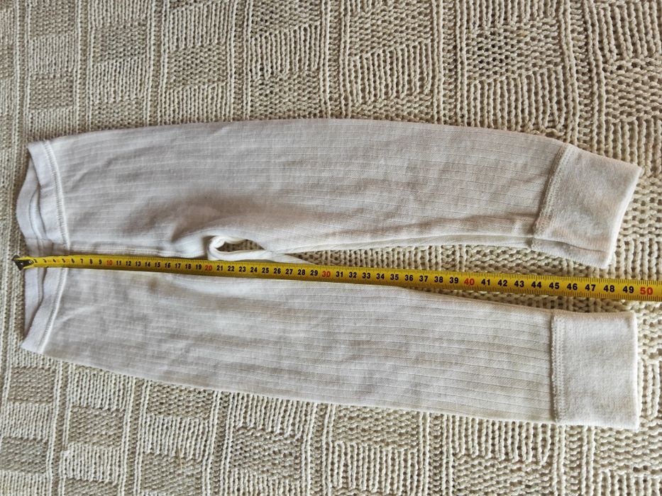 Cubus 80 kremowe wełniane spodnie legginsy w prążek merino i bawełna