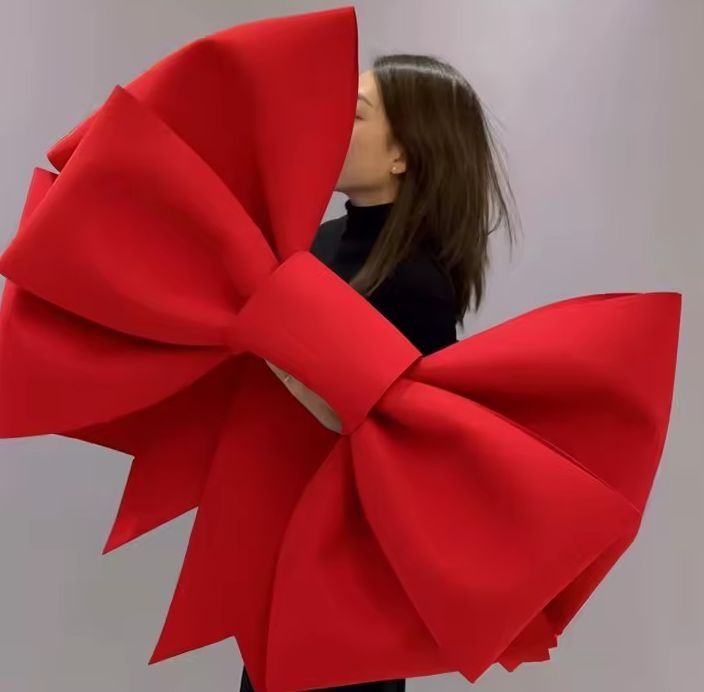 Gigantyczna świąteczna kokarda na drzwi