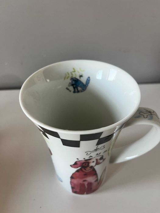 Piękny, ceramiczny kubek z psami