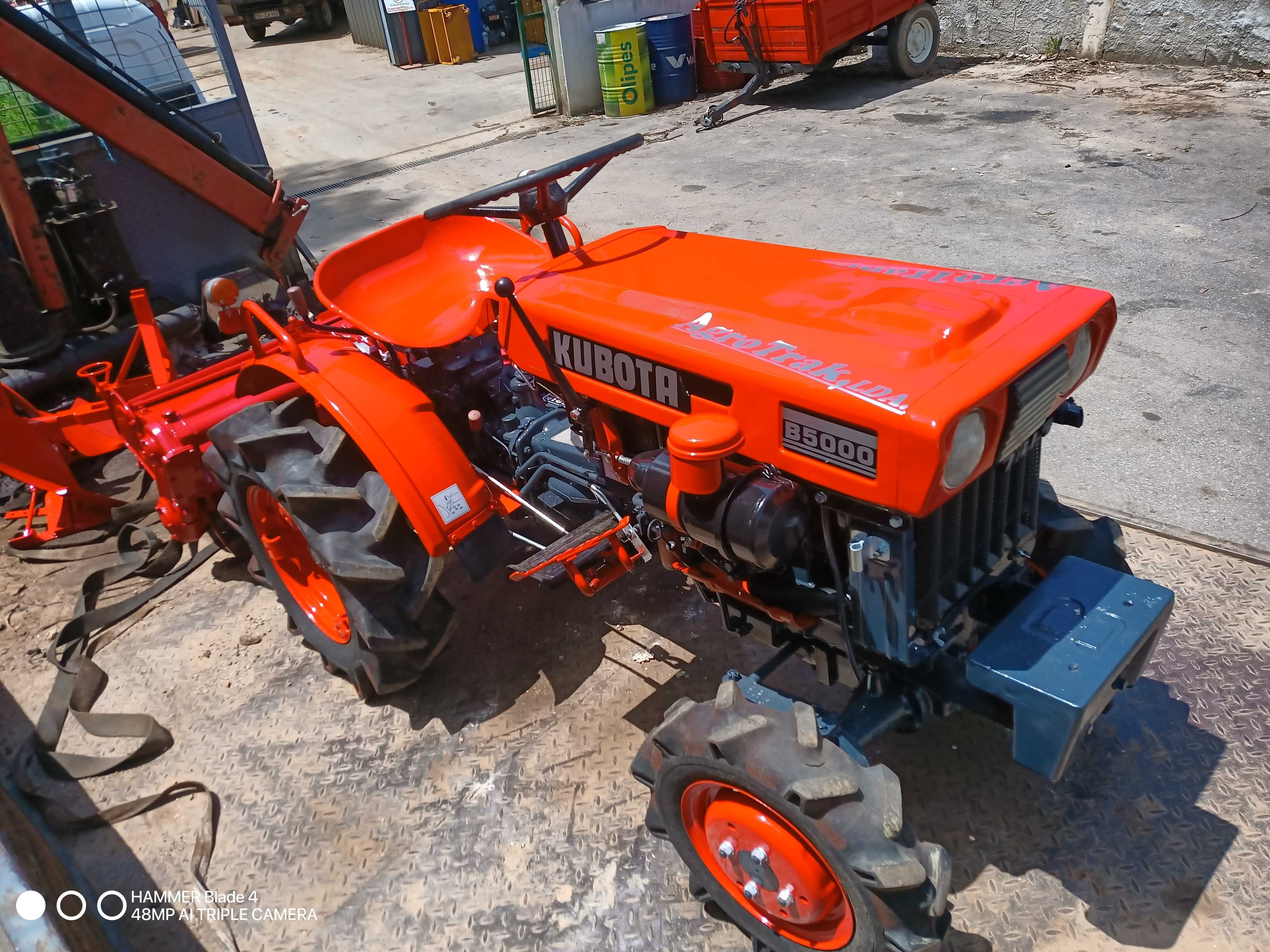 trator kubota com frese
