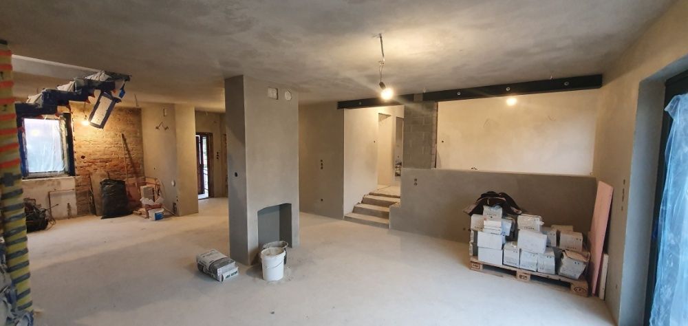 Tynki maszynowe gipsowe i cementowe - firma KONKRET