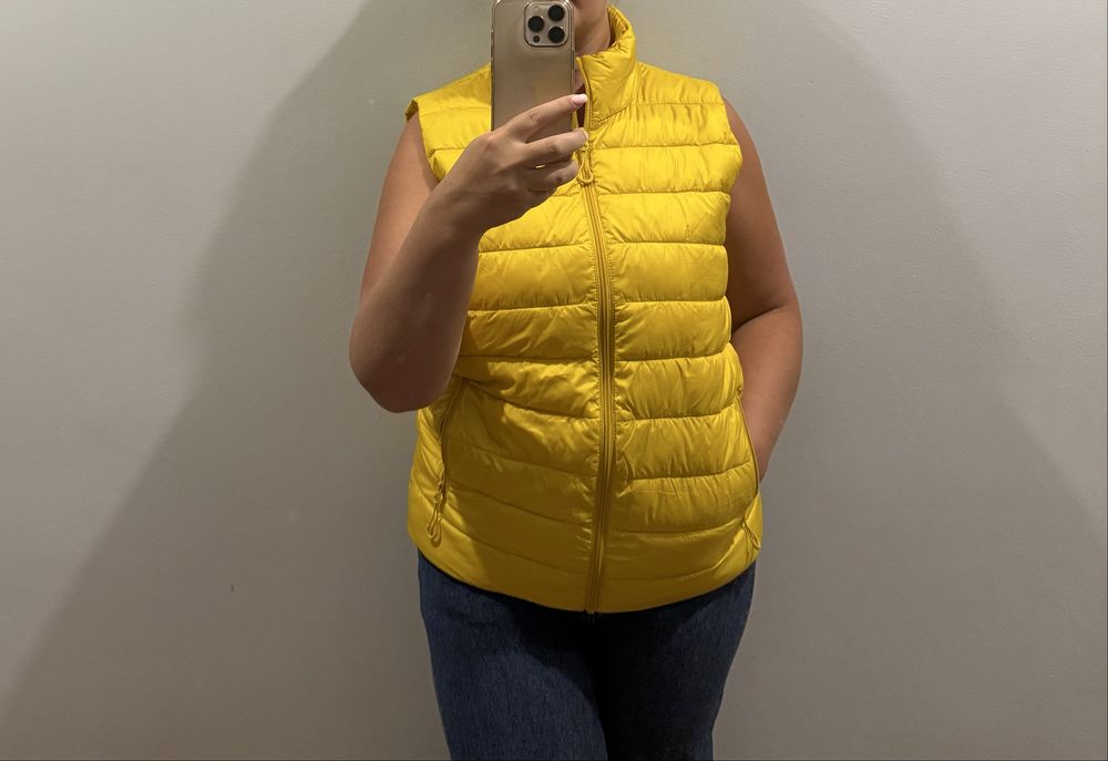 Нова жіноча жилетка