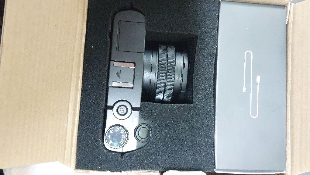 Фотоапарат  новий