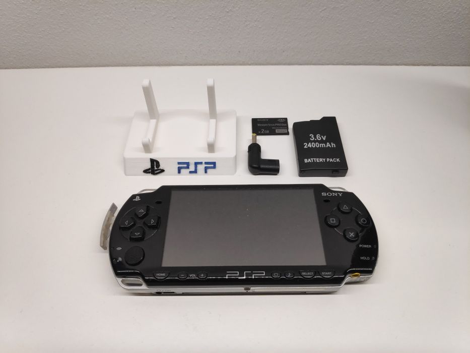 Consola PlayStation Portátil (PSP) com oferta de suporte e 1 jogo