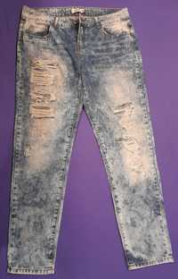 Spodnie jeansowe z dziurami 38