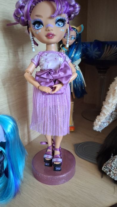 Ляльки Rainbow High і Monster High