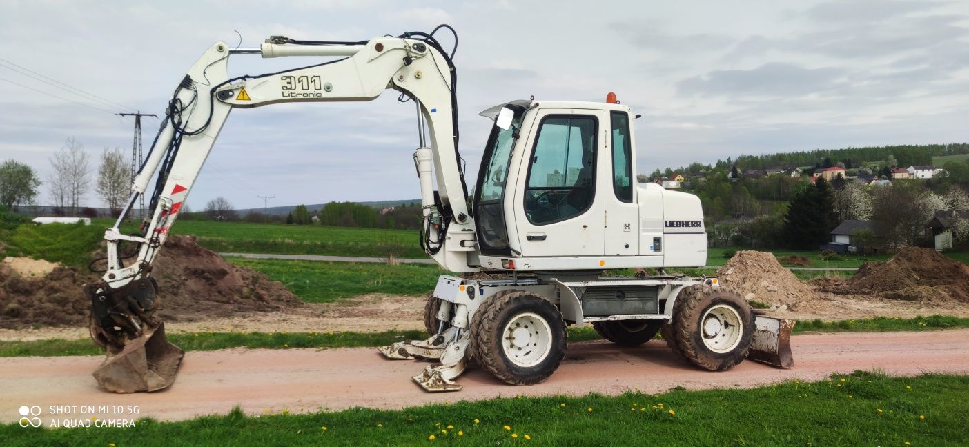 koparka kołowa Liebherr 311 /pług/podpory/centralne smarowanie /