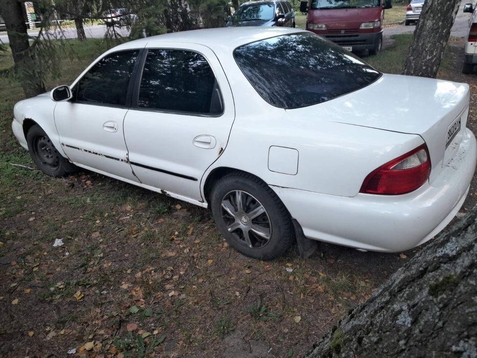 Кіа Кларус 2000 рік 2.0 газ/бензин ціна за двигун частинами