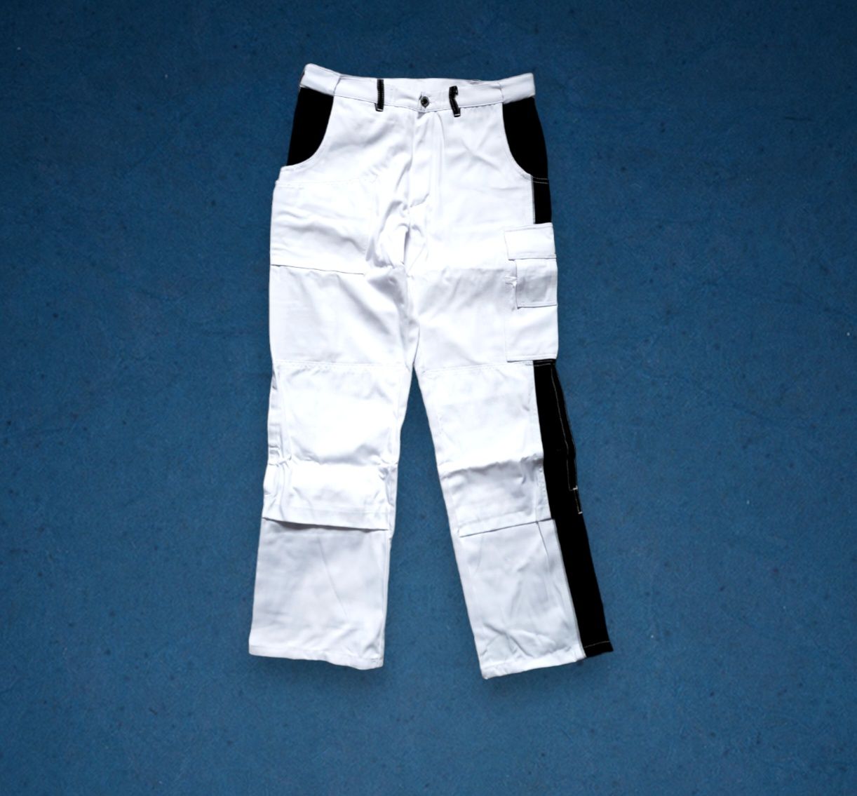 Malarskie spodnie jeansowe, męskie Brillux, R.48
Stan NOWE