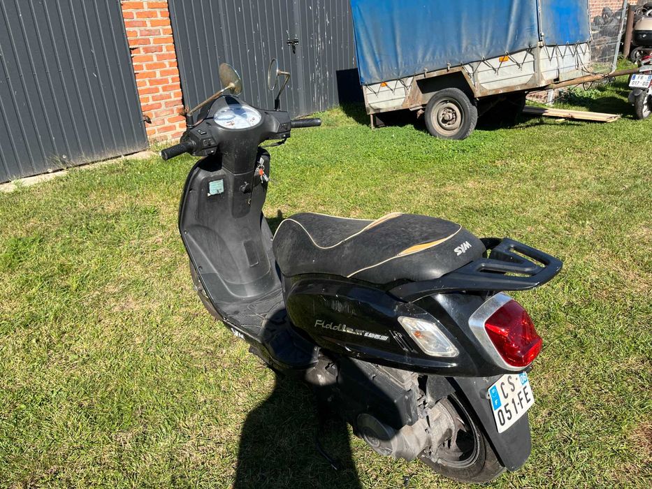 Sym Fiddle II 125 na części lagi czasza osłony gaźnik silnik błotnik