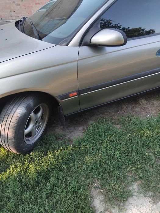 Opel Omega B,2,5 газ/бензин.
