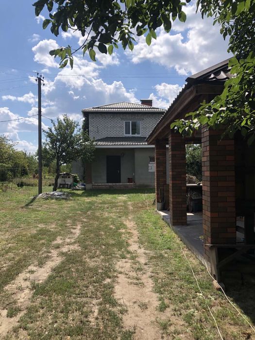 Продам два будинки на одній ділянці в центрі Білецьківки