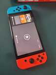 Nintendo Switch OLED + 2 gry