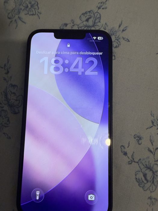 Vendo ipone 13 em bom estado com algumas capss e a e a caixa original