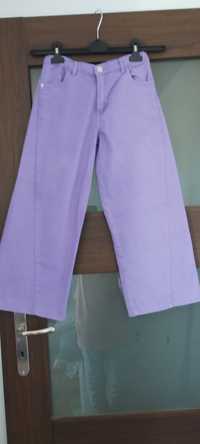 Fioletowe cienkie jeansy r.140