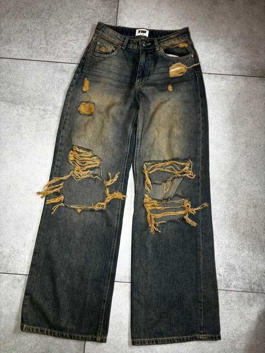 Spodnie damskie oversize modne z dziurami wide leg