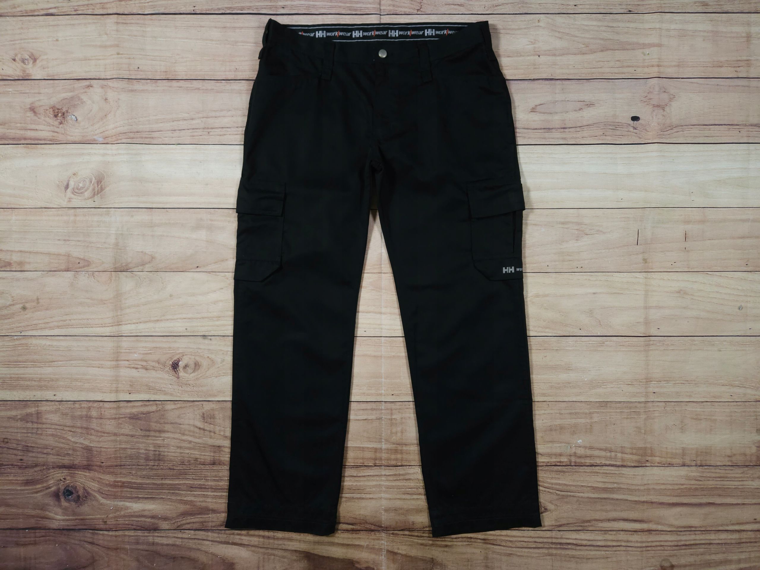 HELLY HANSEN WorkWear Spodnie Robocze Cargo Czarne Logowane r. C44
