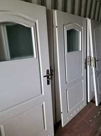 Drzwi Porta wewnętrzne białe, Pełne i łazienkowe z klamkami.90 cm.