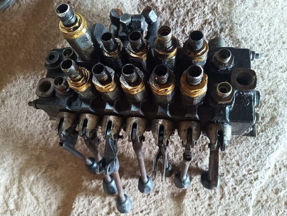 Розподільник гідророзподільник гідравліка ремонт