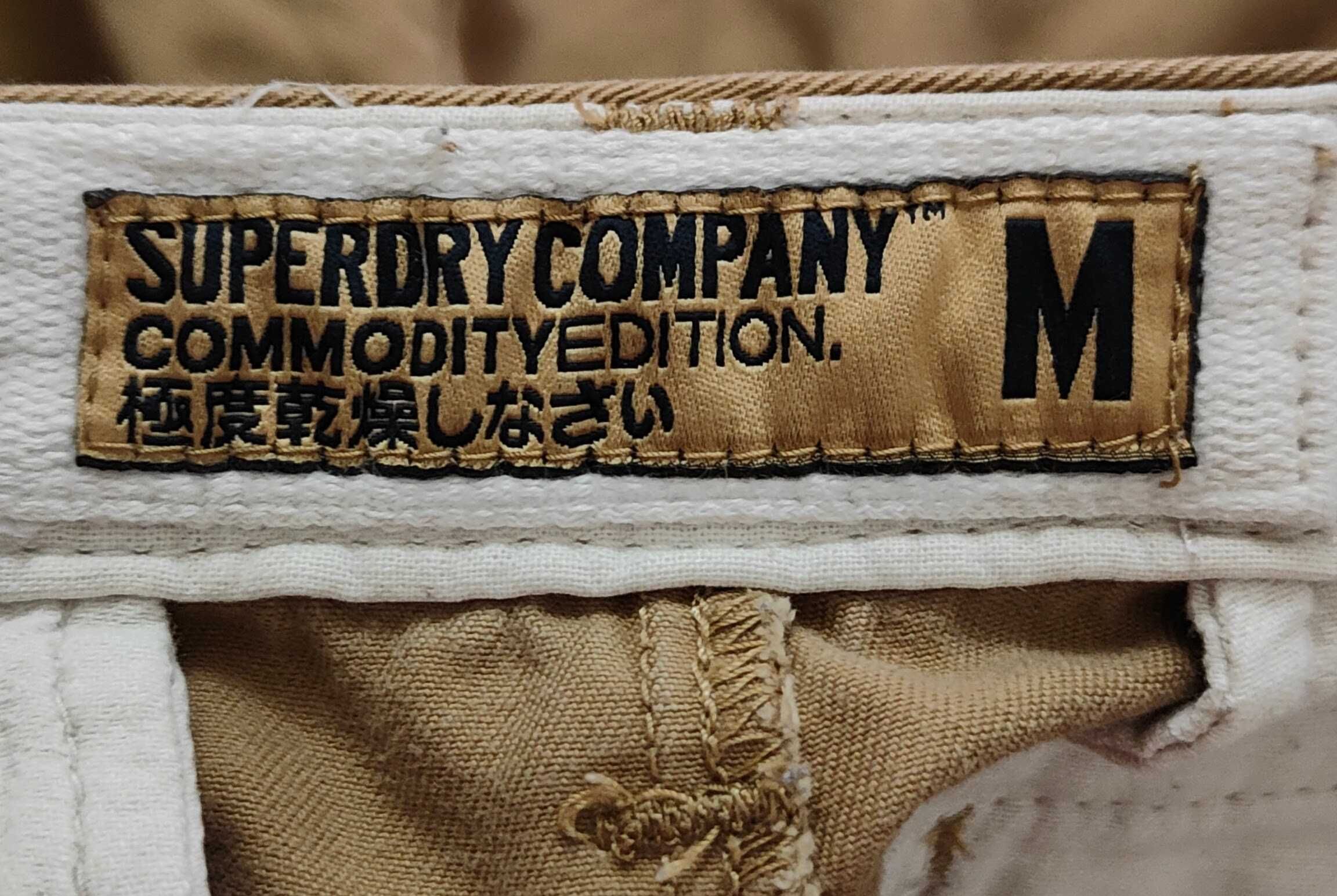 Wr) SUPERDRY męskie spodnie materiałowe Roz.M