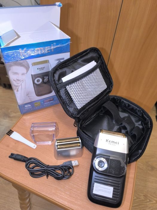 Нова аккумуляторна електробритва шейвер Kemei KM 2026