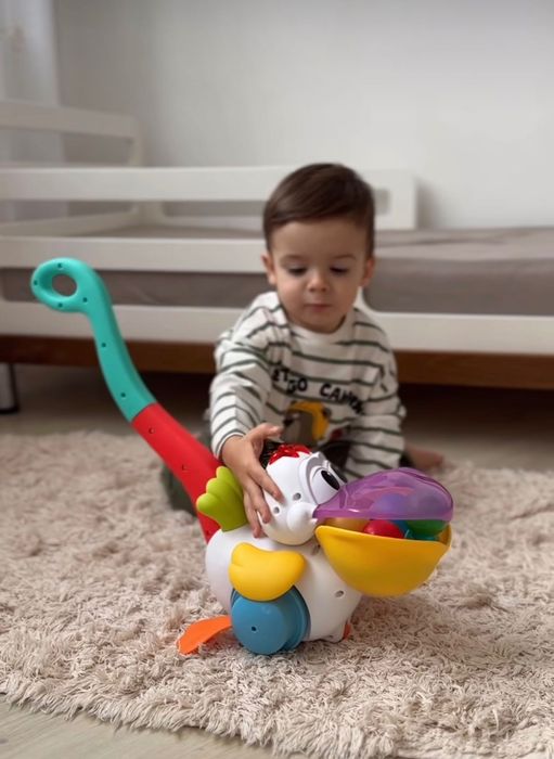 Іграшка-каталка Kiddi Smart – Пелікан-Витівник Пеликан-Затейник укр