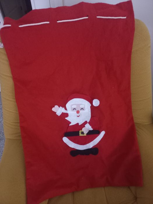 Saco de feltro  com aplicações  de pai natal.